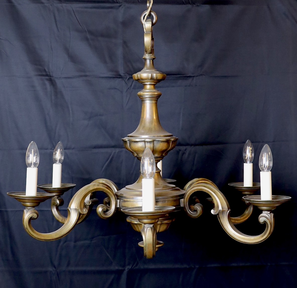 A 1920s-30s French bronze six light chandelier, height including rose 80cm. width 82cm